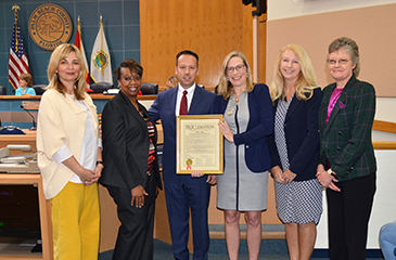 Image of Health Care District Executive Team receiving proclamation